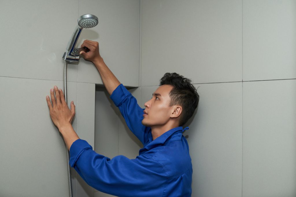 plumber installing shower